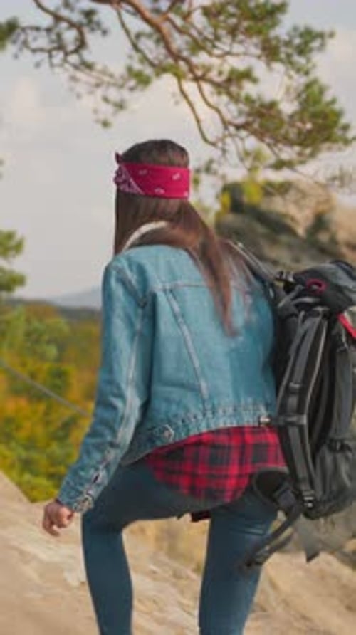 Woman Hiker on Sunny Nature Adventure Trail