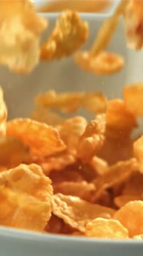 Cornflakes Fall Into a Plate Filmed on a Highspeed Camera at 1000 Fps