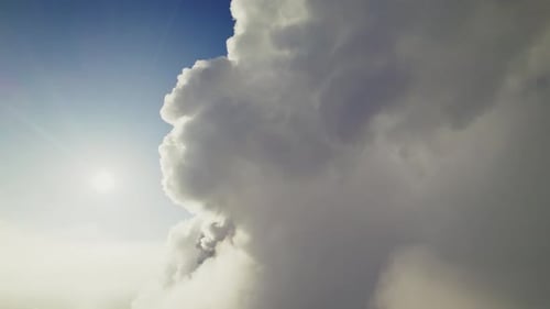 Majestic Cloudscape Evolving Under Sunlight