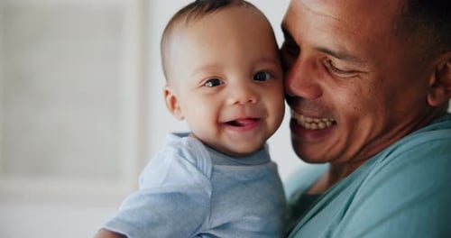 Father, baby or happy with cuddle for love, bonding and support in nursery of family home