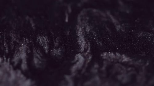 Abstract Close-Up of Black Liquid Motion