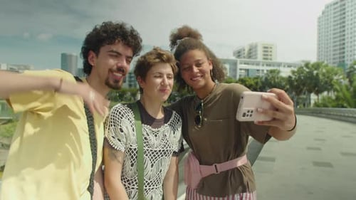 Joyous Gen Z Friends Taking Selfie in City