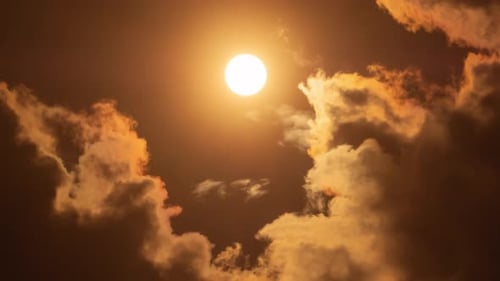 Clouds Obscuring Golden Sun Time Lapse