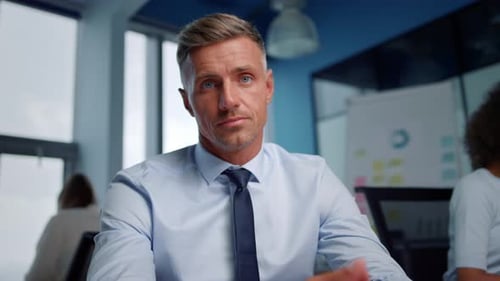 Professional Man Talking in Corporate Meeting