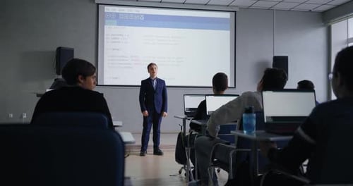 Public Speaking In Classroom Boy Presenting Project In Programming Courses Talk With Classmates
