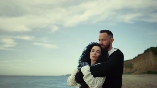 Romantic People Hugging at Seaside Beach. Calm Couple Showing Love on Nature