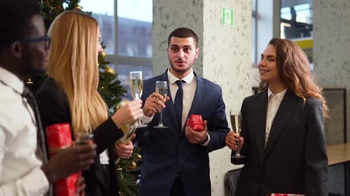 Colleagues Toasting Champagne at Christmas Party