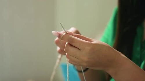 Detailed View of Knitting Process in Natural Light Environment Intimate Scene Showcasing Skilled