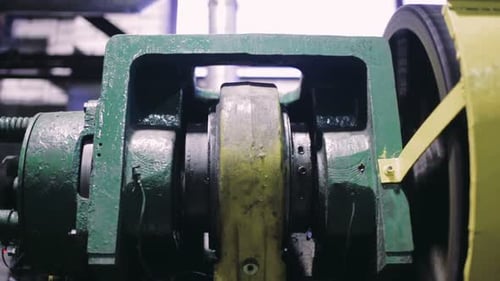Industrial Machine Turning on Factory Floor