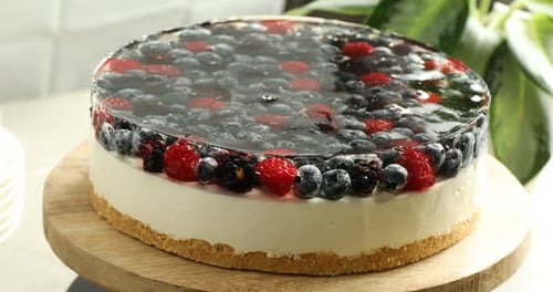 Delicious Berry Cheesecake with Jelly Topping on Display