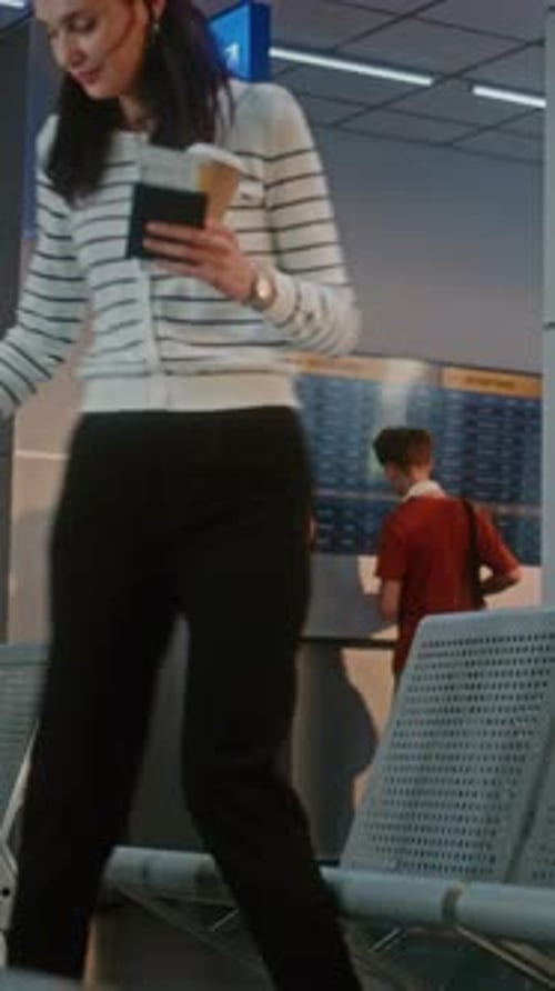 Airport Terminal Happy Woman with Suitcase Sitting in Boarding Lounge After Security Check