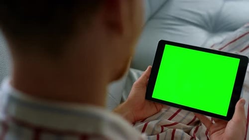 Closeup Hands Holding Chroma Key Tablet. Unknown Man Typing Green Screen At