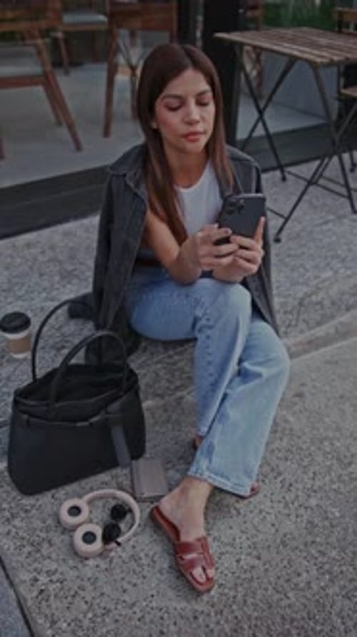 Young Woman Taking a Selfie in a Coffee Shop
