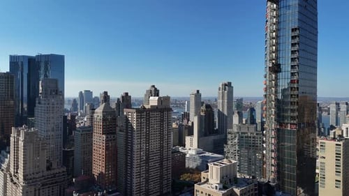 Aerial video above skyscrapers and skyline in Manhattan, New York