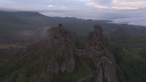 Aerial view of belogradchik fortress and mist at sunrise, Bulgaria.