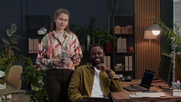 Diverse Couple of Programmers at Creative Workspace, Portrait, Business ...