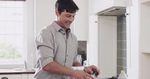 Romantic Couple Embracing in Bright Home Kitchen