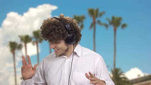 Young Adult Listening to Music with Headphones