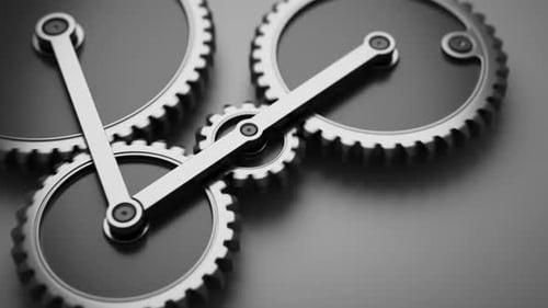 Close-Up of Interlocking Metal Gears in Motion
