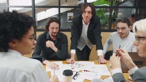 Diverse Business Team Meeting in Modern Office