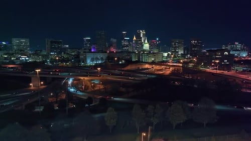 Hyperlapse drone of traffic on overpass highway and interstate in downtown of Atlanta, Georgia. Nigh