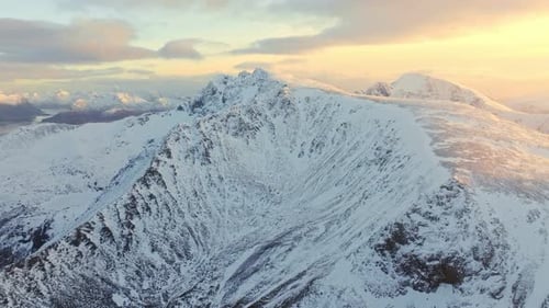 A Majestic SnowCapped Mountain Landscape Perfectly Captured at Sunset During Golden Hour