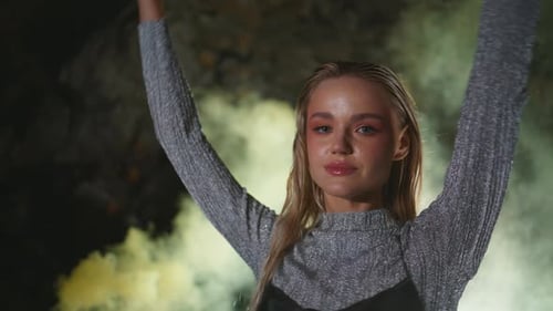 Blonde Woman Posing in front of Smoke