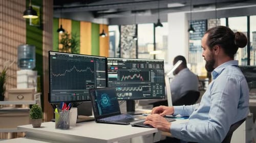 Day Trader in Office Leverages AI Analytics to Interpret Candlestick Charts