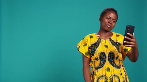 Woman Waves During a Smartphone Video Call
