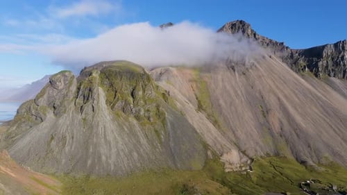 Aerial view of Stokknes mountain and clouds, Iceland.
