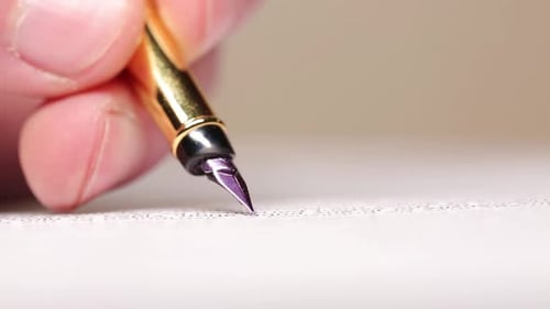 Filling Out Documents With A Beautiful Pen In The Office