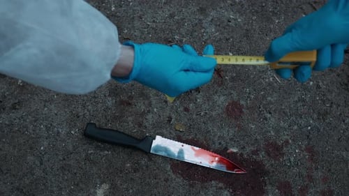 Bloody Knife Evidence at Crime Scene Measured