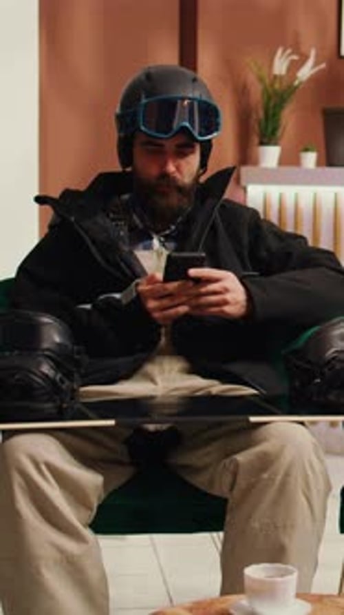 Vertical Video Traveller Texting Messages Before Skiing