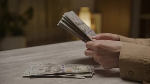 Counting Stacks of One Hundred Dollar Bills