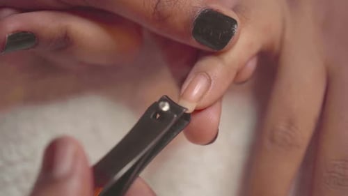 Process Of Clipping Fingernails During A Manicure, Cut With Clippers