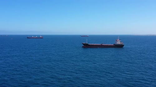 Container and Cargo Ships waiting to Enter Harobor, Mediterranean Sea-Aerial