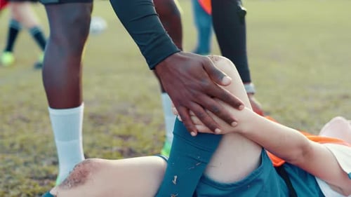 Soccer field, coach and child with knee pain for injury, bone dislocation