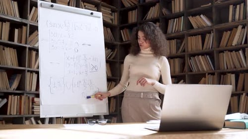 Hispanic Young Woman University Teacher Giving Online Math Class Explaining Equation During