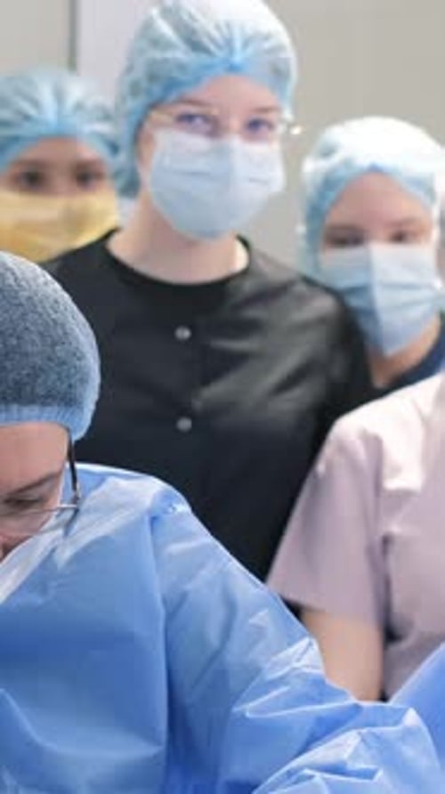 Students of the Medical University Visited a Surgical Operation Observe and Practice Vertical