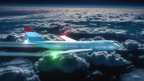 Modern Commercial Jet Flying Over Clouds at Night