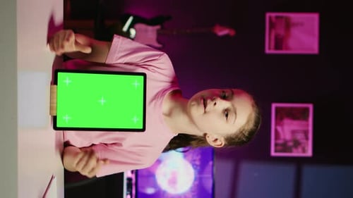 Cute Kid Filming Internet Show Promoting Green Screen Tablet Received From Sponsoring Brand