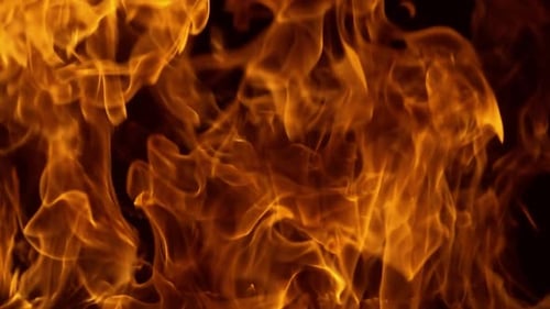 Abstract footage of bright vibrant orange and yellow fire