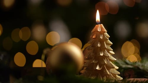 Festive Christmas Tree Candle with Gold Ornaments