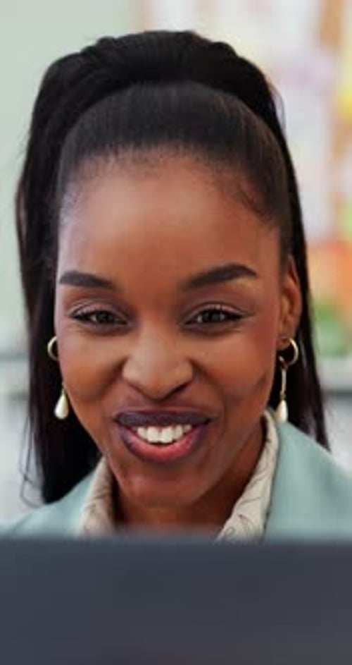 Happy, black woman and laptop with wave for video call, virtual tailor or webinar chat at office