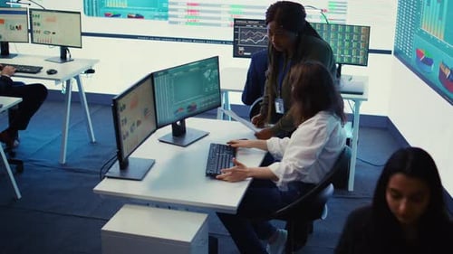 Business Associates Comparing Key Performance Indicators Within the Firm