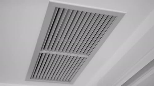 Air Conditioning Unit in White Ceiling
