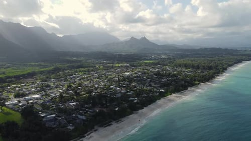 Aerial View of Coastal Town with White Sand Beach and Turquoise Ocean Scenic Tropical Landscape with