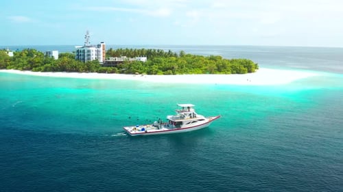 Local Fishermans Boat on Local Island Ukulhas Background in Maldives