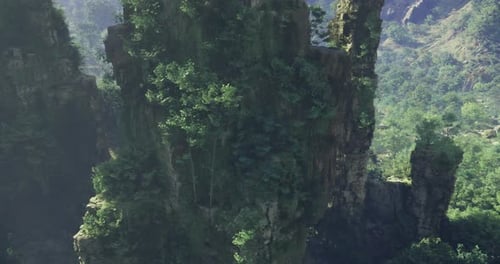 Lush Green Cliffs Rise Majestically in a Stunning Natural Landscape