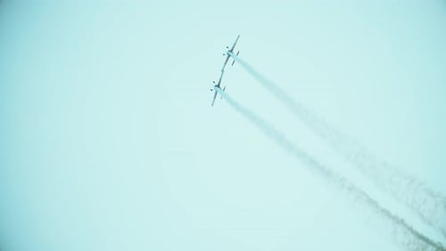 Airplanes Performing Aerial Stunt in Sky